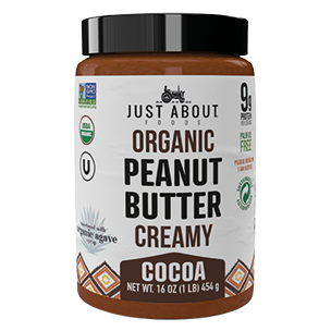 creamy peanut butter with cocoa in jar by Just About Foods